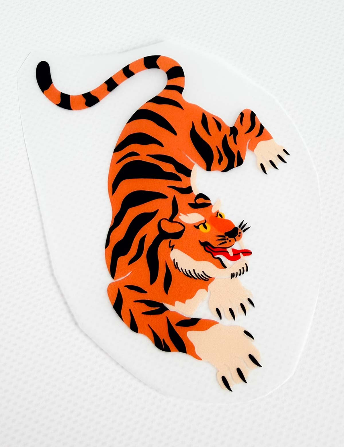 Orange Tiger Pounce – Karussell-Kampf | Bügelbild