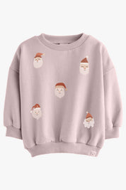 Weihnachtsmänner – All-over-Transferbogen – auf einem Pullover