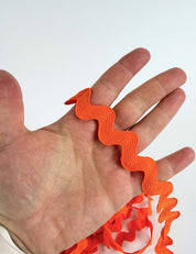 Orangefarbene zackenlitze 13 mm